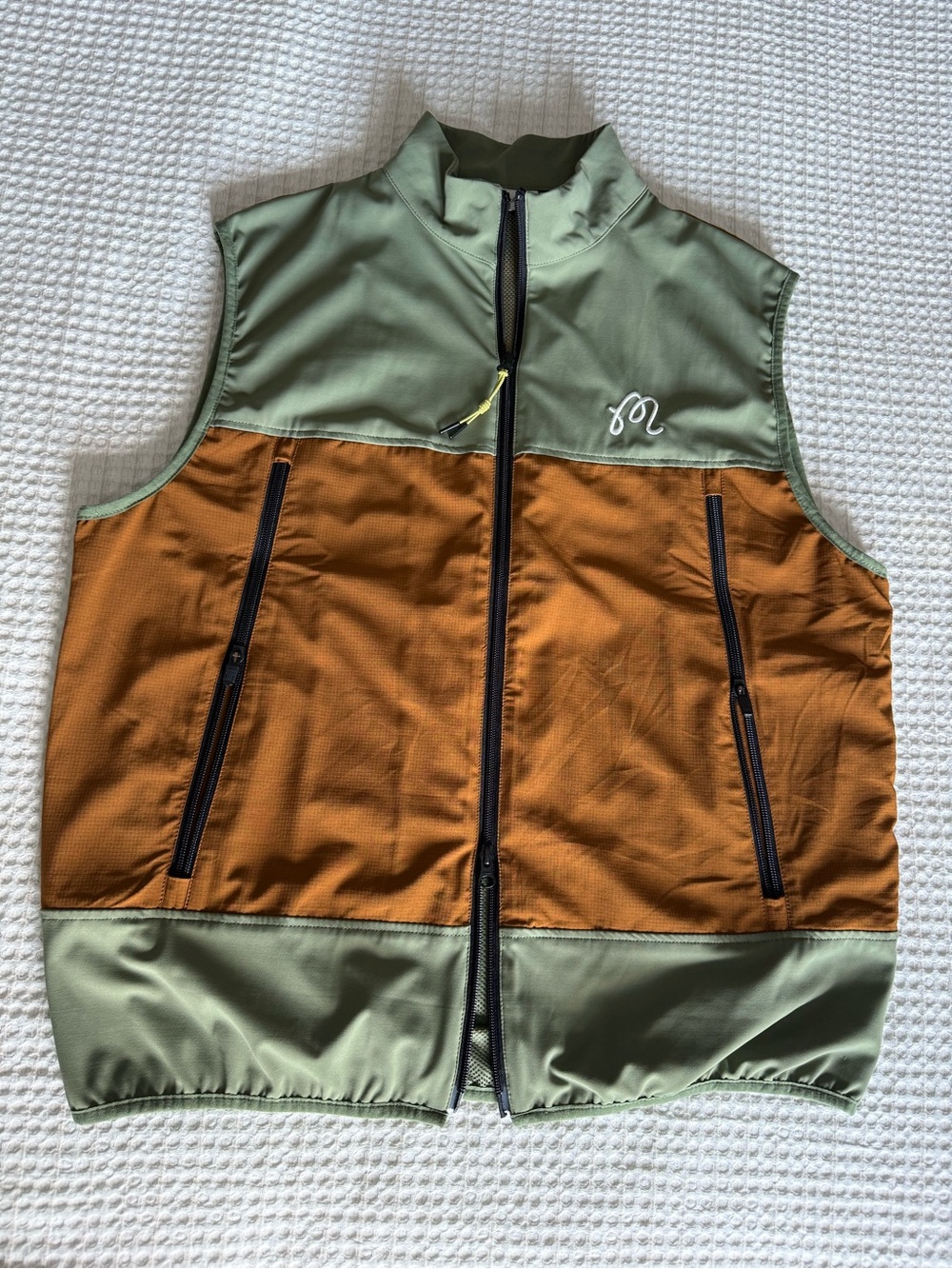 Brand new Malbon Golf Men's Olive Green and Burnt Orange Performance Vest w tags